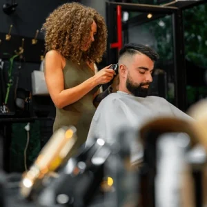 female-barber-meticulously-trims-styles-600nw-2458826581